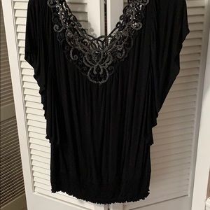 Black with silver around neckline